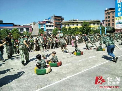 隆回幼儿园举行 上阵父子兵 国防军事拓展亲子活动